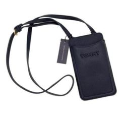 Tommy Hilfiger Elsie Phone Crossbody Bag Pouch Purse In Navy Blue. New With Tags. Tommy Hilfiger's Elsie Phone Crossbody Is Perfect For When You Just Need The Essentials. Safely Store Your Phone And Credit Cards While Enjoying Handsfree Style With The Crossbody Strap. Dimensions: 4-1/2"W X 7-5/8"H (Width Is Measured Across The Bottom Of Bag); 0.39lbs Approx. Weight Silhouette Is Based Off 5'9" Model 23-63/100" Crossbody Strap Magnetic Snap Closure Gold-Tone Hardware, Exterior Card Slots Fits Iph Tommy Hilfiger Bag, Navy Blue Purse, Tommy Hilfiger Handbags, Pouch Purse, Tommy Hilfiger Vintage, Crossbody Bags For Travel, Black Crossbody Purse, Small Crossbody Purse, Canvas Crossbody Bag