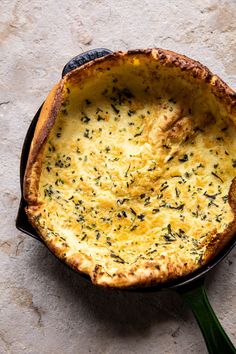 a baked dish in a cast iron skillet