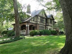 a large house in the middle of some trees