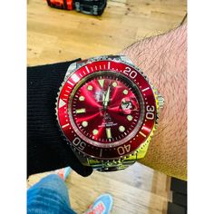 This incredible Invicta watch from the Pro Diver collection offers an exact Automatic movement, with an incredible steel case. The face displays a red, metal dial protected by our proprietary Mineral Crystal. The design is completed by a steel, band. This timepiece can resist water for up to 100 m. Plunge into any horizon using the steadfast guidance of the Invicta Pro Diver. Stylishly classic, internal workings are forged with variations of bold movements. Built with confident prowess, the fort Red Automatic Chronograph Watch With Round Dial, Automatic Red Watch Accessories For Gifts, Red Automatic Watch Accessories For Gifts, Red Automatic Watch Accessories As Gift, Automatic Red Watch Accessories As Gift, Red Automatic Watches With Round Dial, Red Automatic Watch With Round Dial, Red Automatic Watch For Gift, Red Analog Display Watches