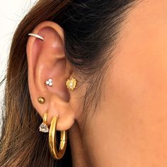 Water resistant 💧 Materials: Stainless steel, cubic zirconia Measurements: 1.2 mm x 8 mm, 16G Closure: Snap Allergy Information: Hypoallergenic Cartridge Ear Piercing, Triple Piercing Earrings Ideas, Best Piercings, Hoop Cartilage Earrings, Cartilage Hoop Earrings, Cartilage Piercings, Midlife Crisis, Piercing Earrings