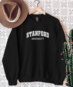 Stanford University Sweatshirt Gift, Stanford University Gift, College Student, University Sweatshirt Hoodie, Custom University College Gift WELCOME TO "StyleDesignUS" High quality and super soft, comfortable Sweatshirt and Hoodies. Made with top of the line vinyl and pressed with a professional grade heat press. SIZING AND COLORS Make sure you check our size-chart before you place your order. If you are not sure about sizing please measure your favorite Sweatshirt or Hoodie and compare measurem Letter Print Hoodie Sweater For College, Campus Hoodie Sweatshirt With Letter Print, Letter Print Hoodie Sweatshirt For Campus, College Hoodie With Letter Print And Crew Neck, Crew Neck Hoodie With Letter Print For College, Cotton Hoodie With Letter Print For Campus, Cotton Letter Print Hoodie For Campus, Collegiate Letter Print Hoodie Sweatshirt, College Cotton Hoodie With Slogan