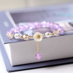 Fashion Crystal Beaded Daisy Flower Lucky Bracelet Elastic Bangle Women Gift Hot | eBay Purple Beaded Bracelets, Purple Beaded, Gelang Manik, Friendship Jewelry, Bracelet Friendship, Crystal Beads Bracelet, Elastic Bracelet, Purple Crystals, Flower Bracelet