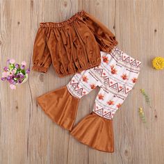 Girls Solid Off Shoulder Top & Bell Printed Trousers Wholesale Girls - PrettyKid Brown Cotton Sets For Fall, Fall Brown Cotton Sets, Playful Playwear Sets For Fall, Cute Fall Bottoms For Playtime, Cute Fall Playtime Bottoms, Fancy Fabric, Printed Flare Pants, Bell Pants, Baby Boutique Clothing