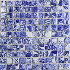 blue and white tiles with different designs on them, all arranged in the same pattern