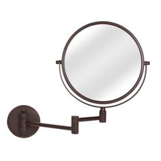 a wall mounted magnifying mirror on a white background