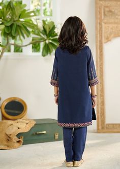 2-Piece Embroidered Suit for Girls (shirt & trouser only). Description DescriptionKameez (Shirt) : Crafted on a solid palette with exquisite embroidery details on shirtShalwar (Trouser) : Plain straight raw-silk pants.Fabric : Paper cotton. Eid Cambric Sets With Mirror Work, Blue Lawn Suit With Mirror Work For Eid, Embroidered Blue Palazzo Set In Cambric, Blue Embroidered Cambric Palazzo Set, Cotton Lawn Suit With Mirror Work For Eid, Eid Cotton Lawn Suit With Mirror Work, Blue Anarkali Lawn Suit With Embroidered Border, Eid Sets With Embroidered Border In Mulmul, Eid Mulmul Set With Embroidered Border