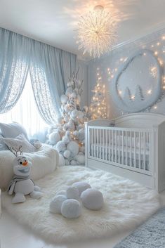 a baby's room decorated for christmas with white and silver decorations, snowflakes and lights