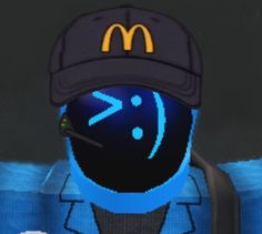 a person wearing a hat and holding a cell phone in their hand with the mcdonald's logo on it