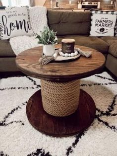 a coffee table sitting on top of a rug in a living room