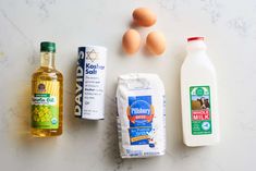 eggs, milk, yogurt, and other ingredients on a counter