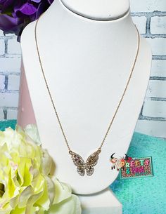 Elevate your style with our Butterfly Dreams Necklace. This elegant necklace features a gold butterfly pendant adorned with sparkling rhinestones, adding a touch of glamour to any outfit. Perfect for any occasion, this necklace is a must-have for any fashion-forward individual Elegant Necklace, Gold Butterfly, Elegant Necklaces, Butterfly Pendant, Shoe Charms, Elevate Your Style, Free Giveaway, Earring Necklace, Girl Gifts