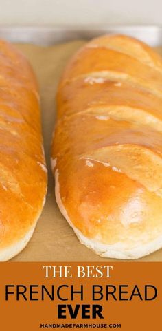 two loaves of bread sitting on top of a piece of parchment paper with the words, the best french bread ever