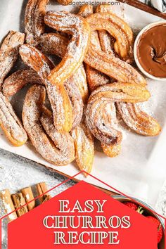 easy churros recipe with chocolate sauce in the middle and cinnamon sticks on the side