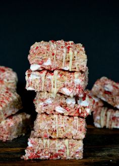 strawberry shortbreads stacked on top of each other with marshmallows drizzled over them