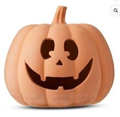 a carved pumpkin is shown on a white background