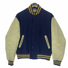 Vintage 90s Golden Bear leather varsity jacket in navy blue colour. Button up wool jacket. Still in good condition EXCEPT some stains on the lining inside. SEE THE PICTURES FOR MORE DETAILS. CONDITION : 8/10 MEASUREMENT Pit : 23.5 inch Length : 23.5 inch Shoulder : 19 inch Arm Length : 24.5 inch Size On Tag : S Recommended Size : M-L PAYMENT We accept PayPal only. The item will be ship 3-5 days once the payment has been made. SHIPPING DHL ONLY. USUALLY AROUND 7-21 DAYS BEFORE REACH THE DESTINATI Blue Varsity Jacket With Button Closure For College, Blue College Varsity Jacket With Button Closure, College Blue Varsity Jacket With Button Closure, Classic Navy Varsity Jacket For College, Winter Varsity Jacket With Snap Buttons, Classic Navy Varsity Jacket For Fall, Wool Outerwear With Button Closure For Streetwear, Classic Navy Outerwear For College, Retro Wool Varsity Jacket For Streetwear