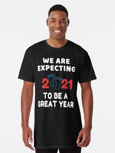 a man wearing a black t - shirt that says we are expecting to be a great year