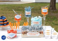 candy bar with candies, lollipops and candy sticks on the table