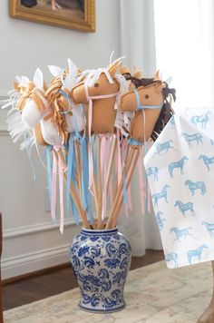 an instagram page with a horse themed vase and paper streamers on the table