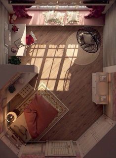 an aerial view of a living room and bedroom from the top down on a wooden floor