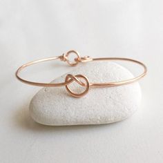 Gold Love Knot Bracelets / Tie the Knot Bangle / Bridesmaids Gifts / Wedding Favor / Gold Infinity Knot / Gold Knot Bracelet / Knot BangleThis gold knot bracelet would make a great bridesmaid gift or for farewell / graduation gift, even for sorority sisters! The knot shape represents the bond you made with your loved one.Shall you need multiple pieces, please choose the quantity in the drop down menu.Thanks!Gracy●AFFORDABLE BRIDESMAIDS BRACELET BEST SELLER♥The price is including SEPARATED POUCHE Adjustable Bangle For Bridesmaid Gift, Adjustable Rose Gold Bracelets For Wedding, Adjustable Bracelets For Wedding Gift, Adjustable Bangle Bracelets For Bridesmaid Gift, Bracelet Tie, Bracelet Knot, Gold Knot Bracelet, Knot Bracelets, Gold Wrap Ring