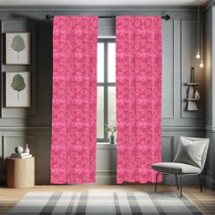 pink curtains in a living room with grey walls