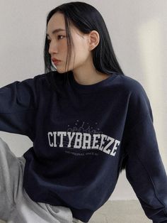 Cut from structured cotton blend fabric, this unisex sweatshirt has comfortable, relaxed silhouette and is accentuated with wide logo and artwork printing at front.  - Intended for a loose fit- Comfortable dropped shoulders - Arch-shaped logo printing - Mini logo label at side- Ribbed finishes at edges - Versatile styling and easy layering Oversized Navy Tops With Letter Print, Navy Oversized Tops With Letter Print, Navy Oversized Top With Letter Print, Blue Crew Sweatshirt With Text Print, Navy Crew Neck Sweatshirt With Logo Print, Navy Cotton Sweatshirt With Logo Print, Blue Long Sleeve Sweatshirt With Text Print, Navy Crew Neck Sweatshirt With Logo, Navy Sporty Sweatshirt With Graphic Print