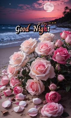 some pink roses on the beach with good night message