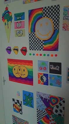 a white refrigerator covered in lots of colorful magnets and stickers on it's side