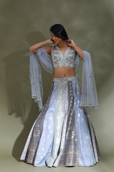 Dance the night away at weddings in this beautiful powder blue embroidered designer lehenga. It comes with a matching dupatta. Shop designer lehenga in USA from Pure Elegance. Disclaimer:The actual product may vary slightly from the image. These are custom orders, hence expect slight variation in color, placement of the motif or buta. ESTIMATED DELIVERY: Because this is a custom order, it would take about 4 weeks from the date of purchase. RETURN POLICY: This product is a custom order and cannot Festive Light Blue Sharara For Reception, Light Blue Sharara With Dupatta For Reception, Light Blue Floor-length Sets With Resham Embroidery, Festive Light Blue Embroidered Choli, Light Blue Bollywood Style Set With Sheer Dupatta, Light Blue Bollywood Set With Sheer Dupatta, Bollywood Style Light Blue Set With Sheer Dupatta, Bollywood Light Blue Sets With Sheer Dupatta, Bollywood Light Blue Set With Sheer Dupatta