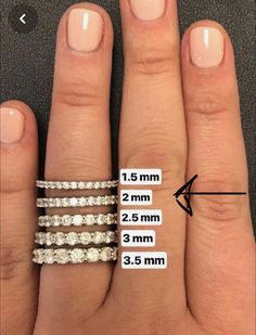 the size and width of three rings on someone's hand with measurements for each ring