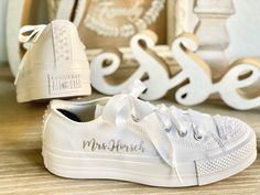 These Custom Converse shoes are sure to make your big day extra special and comfy, they are a perfect gift for Birthdays or your bridesmaids and even for the whole wedding party. ✨✨Designs and Texts✨✨ ⭐️ Tell Us in the personalization section your own words. ⭐️ If you like a different design message me and I will be happy to work with you to create unique shoes for you. ⭐️ If you want a different color of shoes message me and I will try my best to get them for you. ⭐️ Want a different text color, no problem just message me, and will get it for you. ✨✨Ribbon Color and Length✨✨ ⭐️ For the Low top style, we use White Satin ribbon 51" in Length and 2 CM wide / let me know if you want a longer one. ⭐️ For the High Top style, we use White Satin Ribbon with 55" Length and 2 CM wide/ let me know i Converse Customized, All White Converse, Wedding Gifts Ideas, Sneakers Wedding, Custom Converse Shoes, Bridal Sneakers, Wedding Converse, Wedding Sneakers, Custom Converse