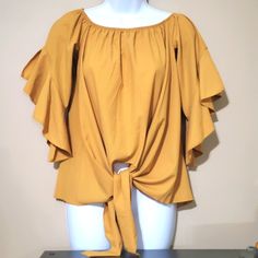 On Or Off Shoulder Merrow Edge Open Slit Ruffle 3/4 Sleeve Front Tie Hi Low Hem Blouse Color: Golden (Mustard) Yellow Chic Tops Blouses, Green Silk Shirt, Flowy Tops Summer, Ruffle Neck Blouse, Metallic Blouses, Mock Neck Blouse, Lace Tee, White Tunic, Hem Blouse