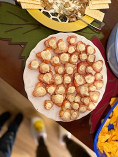 food is on the table and ready to be eaten by someone at their party or social gathering