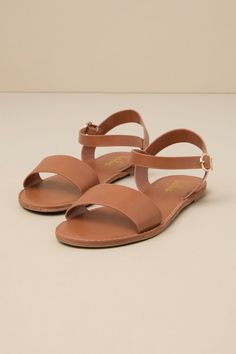 Get back to basics in the Insta-worthy Lulus Hearts and Hashtags Tan Flat Sandals! You can wear these vegan leather sandals anywhere, with their simple brown toe band and gold-buckled tan ankle strap. 0. 25" rubber heel. Smooth synthetic insole. Nonskid rubber sole. All Man Made Materials. Imported. Lulus | Hearts and Hashtags Tan Flat Sandal Heels | Size 5.5 | Vegan Friendly. Brown Sandals Flat, Bridesmaid Sandals, Spring Shoes Women, Everyday Sandals, Black Sandals Flat, Tan Flats, Tie Sandals, Simple Sandals, Nude Shoes