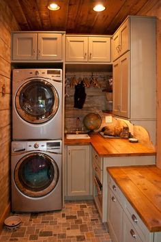 a washer and dryer in a small room