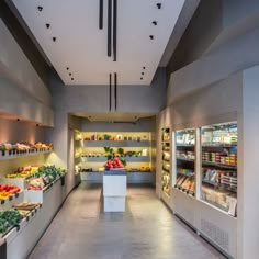 the interior of a store filled with lots of food