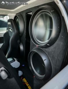 the inside of a car with speakers in it