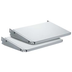 two silver metal plates sitting on top of each other