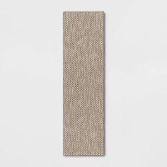 a beige bookmark on a white background