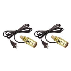 two gold colored lights are plugged into the cord