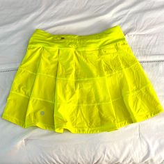 Discontinued Lululemon Pace Rival Skirt Size 2 Color Highlighter Yellow Only Wore A Few Times I Still Have The Tag Lululemon Tennis Skirt, Tennis Skirt Black, Pace Rival Skirt, Street Skirt, Tall Skirt, Lululemon Pace Rival, Pleats Skirt, Lululemon Skirt, High Rise Skirt