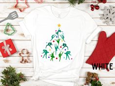 Show your festive side and your dancer pride simultaneously with this adorable dancer Christmas tree tee! Great gift for the dancers, dance teachers, and holiday lovers in your life! This classic unisex jersey short-sleeve tee fits like a well-loved favorite. These t-shirts have ribbed knit collars to bolster shaping, and the shoulders have taping for a better fit over time. Dual side seams hold the garment's shape for a long time.   .: Direct-to-garment printing means your design will last much Christmas Gifts For Dancers, Dance Christmas, Holiday Tee Shirts, Dance Things, Cute Dance, Dance Teacher Gifts, Sport Shirt Design, Christmas Dance, Preppy Christmas