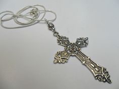 "This is a lovely cross themed pendant necklace. The cross is approx. 5cm long x 3cm wide. On an 18\" silver plated snake chain. Thanks for looking!!" Antique Silver Cross Pendant Necklace For Gift, Silver Ankh Cross Spiritual Necklace, Silver Ankh Cross Necklace Spiritual Style, Silver Ankh Cross Necklace In Spiritual Style, Adjustable Silver Cross Necklace, Nickel Free, Silver Spiritual Cross Necklace, Silver Bohemian Cross Necklace, Hamsa Tattoo Design, Hamsa Tattoo