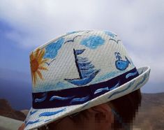 "A phone number is needed along with your order!♥ Hand Painted Kid's Straw Hat \"Sailing Boat\" ♥ ♥ The MUST HAVE hand painted straw hat from \"GiftStoriesGr\"!  This straw hat is created in sunshine Greece and all the details are 100% hand painted. Perfect for any occasion under the sun! Take it to the beach, Bachelorette party, Vacation, Seaside wedding and christening, Summer beach parties....In all occasion! DETAILS: ❀ Unique Hand painted straw hat painted with love and imagination. Sea, Sun Adjustable Nautical Hats For The Beach, Nautical Beach Hat With Curved Brim, Nautical Style Beach Hat With Curved Brim, Adjustable Nautical Beach Hat, Summer Arts And Crafts, Boat Hat, Whale Painting, Toddler Beach, Painted Items