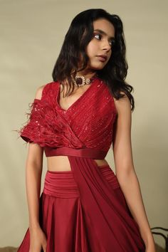 Carmine red cold-shoulder blouse with beads, sequins and thread embroidery. Comes with a lehenga.
Components: 2
Pattern: 3D Embroidered
Type Of Work: Beads, Sequins, Thread
Neckline: V Neck
Sleeve Type: Sleeveless
Fabric: Satin organza, Organza, Chanderi
Color: Red
Other Details: 
Note:
Necklace worn by the model is not for sale.
Only the product mentioned in the description is being sold.
Occasion: Sangeet - Aza Fashions Blouse With Beads, Embroidered Beads, Cold Shoulder Blouse, Thread Embroidery, Fashion App, Red Satin, Embroidered Blouse, Set For Women, Aza Fashion