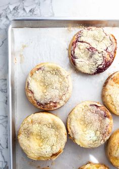 freshly baked pastries on a baking sheet ready to be eaten for lunch or dessert