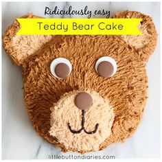 a teddy bear cake is made to look like it has eyes and nose on it