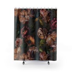 a shower curtain with an image of flowers and leaves on the outside, against a white background